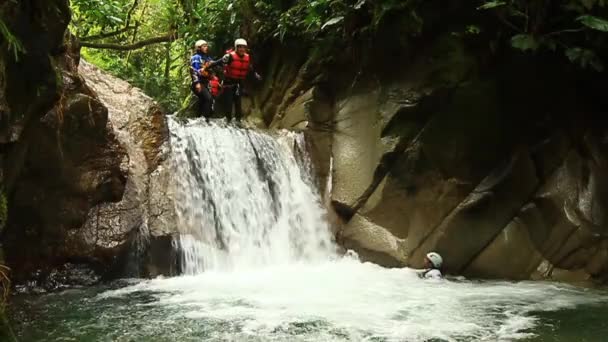 Waterfall Jump On Canyoning Trip — Stock Video