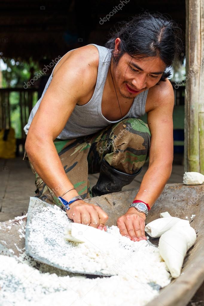 Cassava Preparation By Indigenous Adult Man