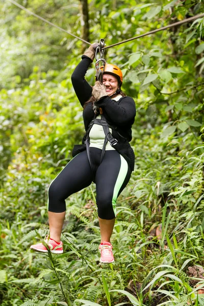 Scared Oversized Adult Woman On Zip Line (dalam bahasa Inggris) — Stok Foto