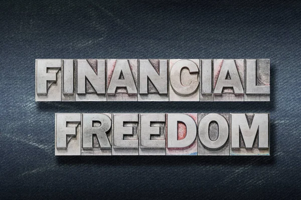 Financial Freedom Phrase Made Metallic Letterpress Dark Jeans Background — Stock Photo, Image