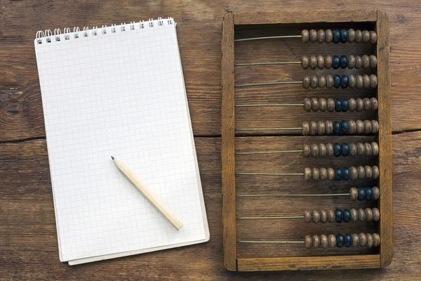 Abacus e notas — Fotografia de Stock