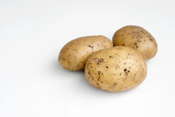 Three potatoes — Stock Photo, Image