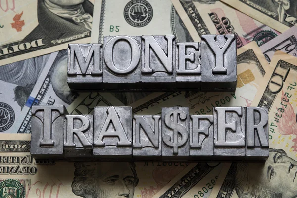 Money transfer met — Stock Photo, Image