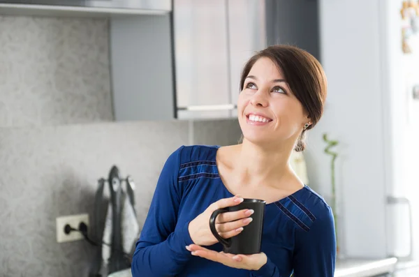 Morning housewife with cup of coffee — Stock Photo, Image