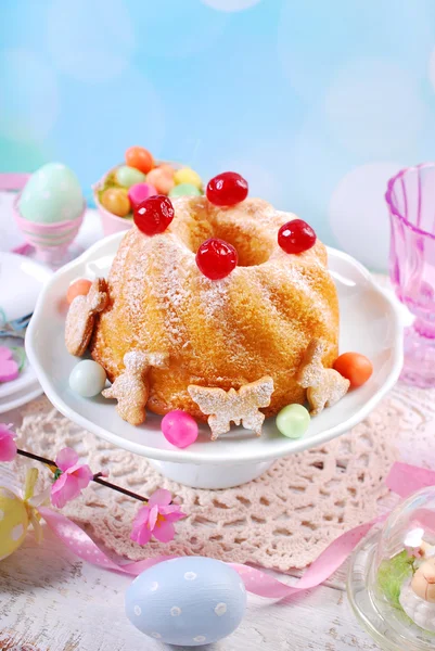 Easter ring cake with cherry decoration and icing sugar — Stock Photo, Image