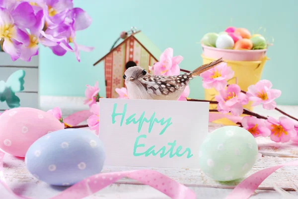 Easter background  with pastel eggs and white  card with greetin — Stock Photo, Image