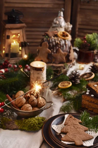 Christmas Table Decoration Traditional Pastries Walnuts Rustic Style Sparklers Fireworks — Stock Photo, Image