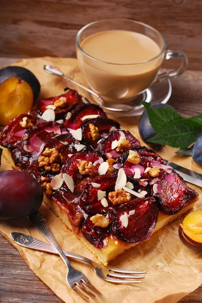 Plum cake with almonds and walnuts — Stock Photo, Image