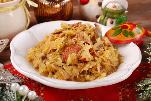 Sauerkraut with mushrooms and sausage for christmas — Stock Photo, Image