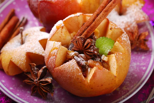 Baked apples with nuts and raisins for christmas — Stock Photo, Image