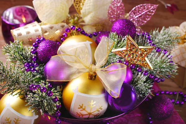 Christmas decoration in purple and golden colors — Stock Photo, Image