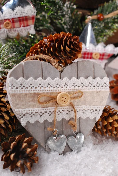 Christmas decoration with wooden heart — Stock Photo, Image