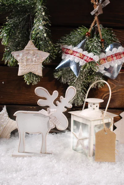 Winter scene with wooden reindeer and lantern for christmas — Stock Photo, Image