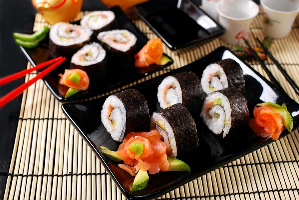 Sushi set with salmon and avocado — Stock Photo, Image