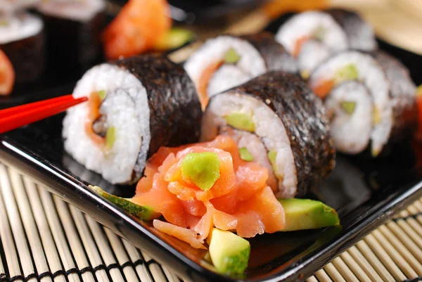 Sushi set with salmon and avocado — Stock Photo, Image