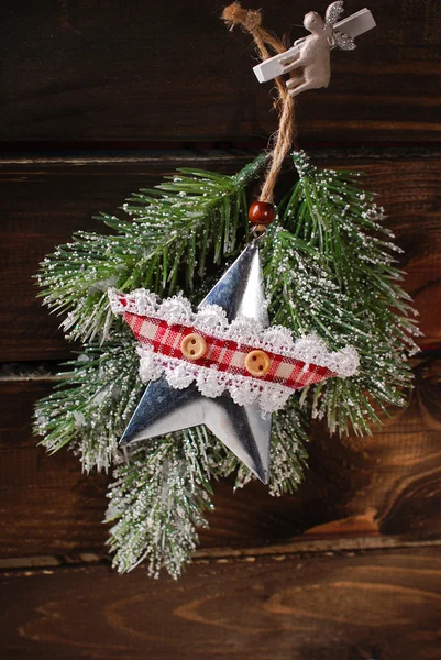 Christmas decoration with vintage metal star — Stock Photo, Image