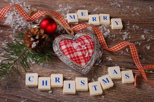 Merry christmas greeting card on wooden background — Stock Photo, Image