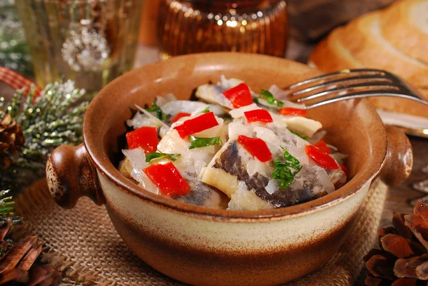 Herring salad for christmas on wooden table — Stock Photo, Image