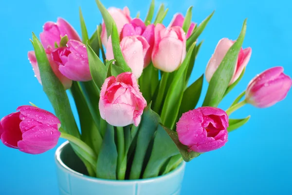 Bunch of pink tulips in vase Stock Image