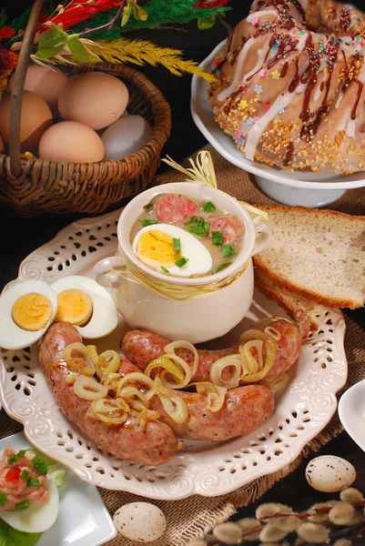 Easter traditional dishes on rural wooden table — Stock Photo, Image