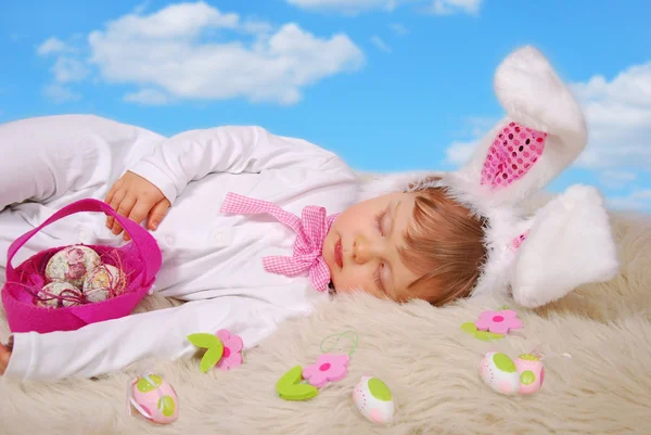 Sleeping baby in easter bunny costume — Stock Photo, Image