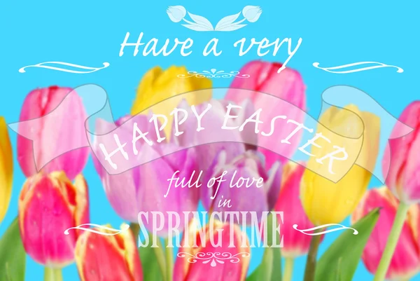 Easter card with greeting text on colorful tulips background — Stock Photo, Image