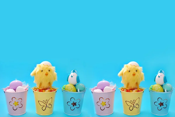 Easter border with eggs in pastel color buckets — Stock Photo, Image