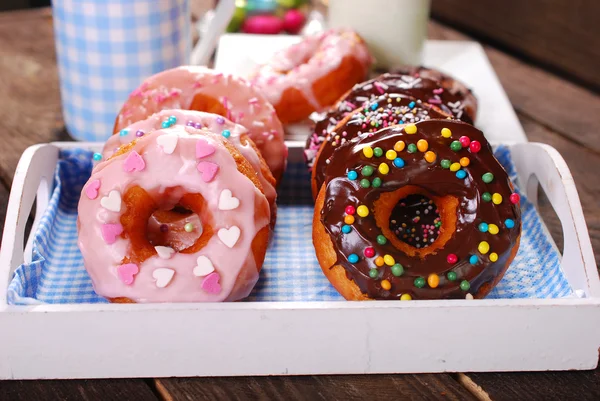 Homemade donuts with chocolate and icing glaze — Stock Photo, Image