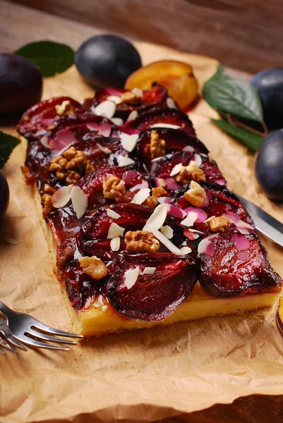 Homemade plum cake with walnuts and almonds — Stock Photo, Image