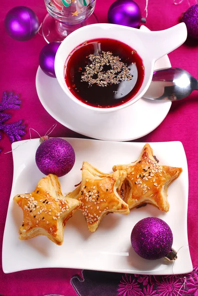 Red borscht and puff pastries for christmas — Stock Photo, Image