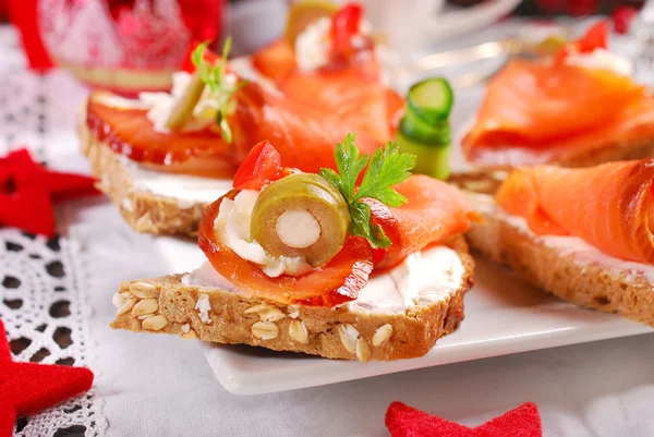 Salmon and cheese canapes for christmas — Stock Photo, Image