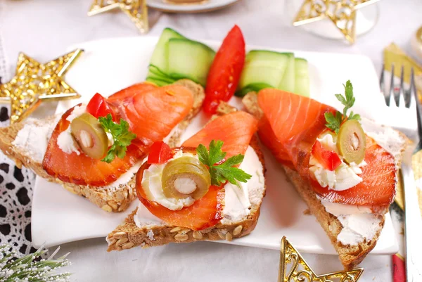 Salmon and cheese canapes for christmas — Stock Photo, Image