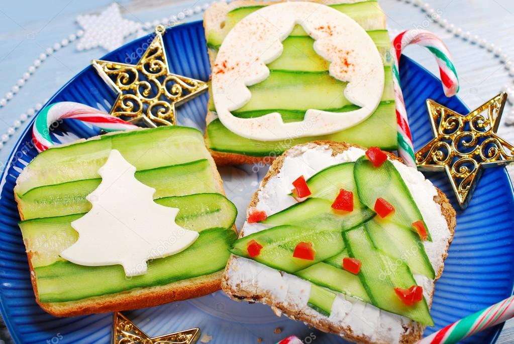 Three christmas tree shape sandwiches — Stock Photo © teresaterra