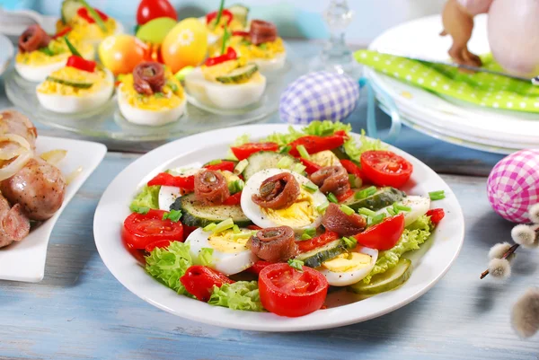 Fresh vegetable salad with anchovies for easter — Stock Photo, Image