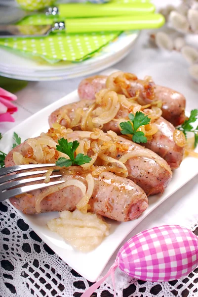 Roasted white sausage with onion for easter — Stock Photo, Image