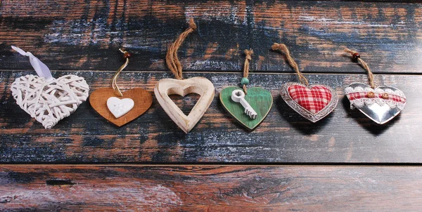 Six different  hearts on shabby background — Stock Photo, Image