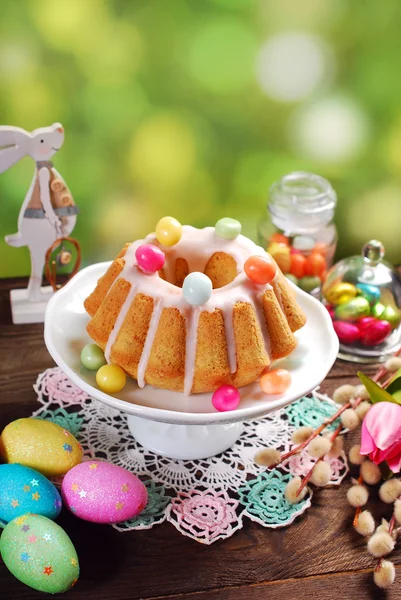 Easter almond ring cake on wooden table — Stock Photo, Image
