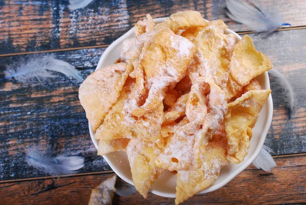 Traditional in Poland deep fried pastry faworki for carnival par — Stock Photo, Image