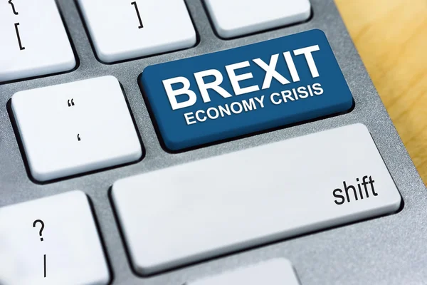 Palavra escrita Brexit Economy Crise no botão azul do teclado. Brexit UK Conceito de referendo da UE — Fotografia de Stock