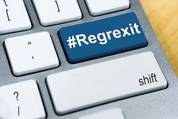 Written word #Regrexit on blue keyboard button. Brexit UK EU referendum concept — ストック写真