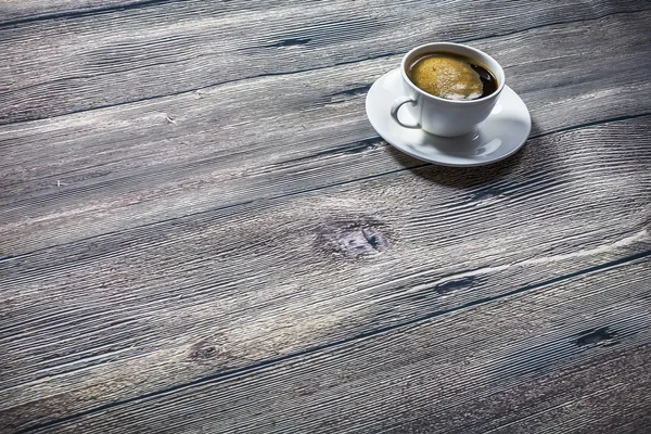Coffee cup top view on wooden table background — Stock Photo, Image