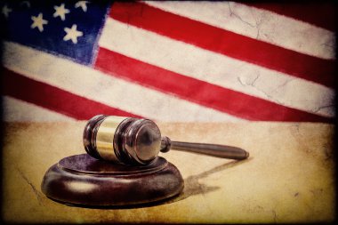 Gavel on a background of the American flag,old style clipart