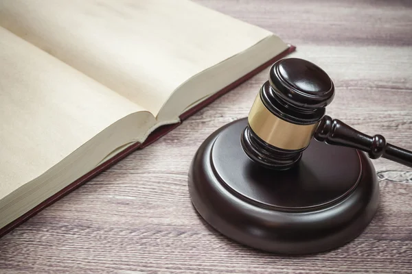 Judge gavel and book on the brown wooden table, justice — Stock Photo, Image