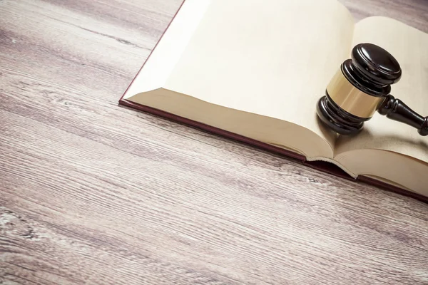 Judge gavel and book on the brown wooden table, justice — Stock Photo, Image