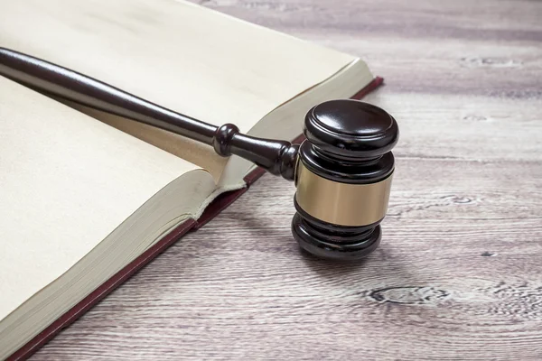 Judge gavel and book on the brown wooden table, justice — Stock Photo, Image