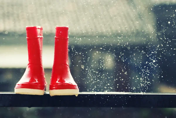Red rain boots — Stock Photo, Image