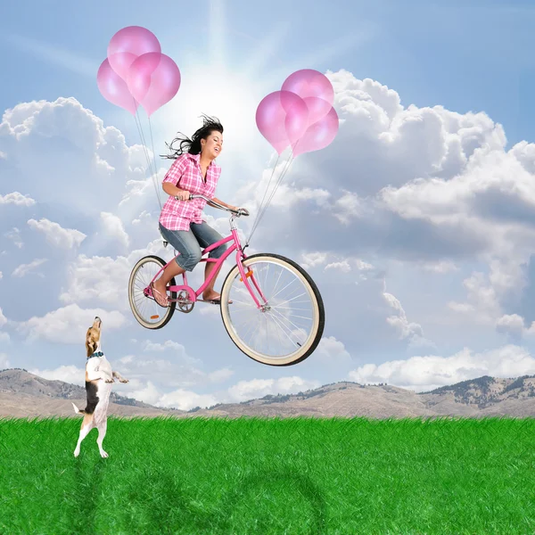 Holka jela na kole balon — Stock fotografie