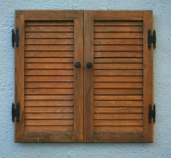 Shutters on wall — Stock Photo, Image