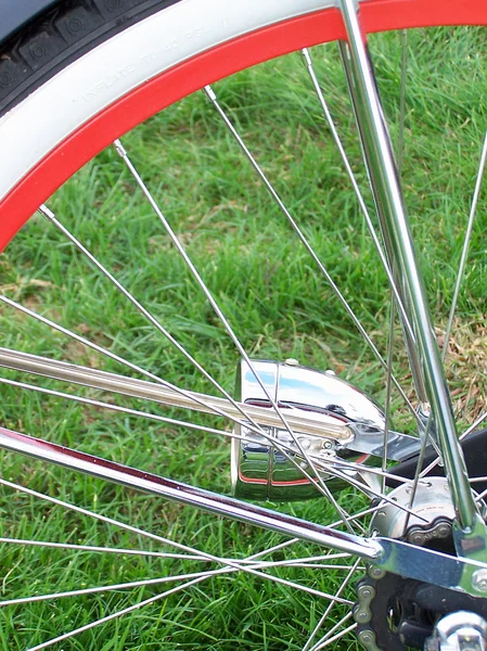 Bike tire on grass — Stock Photo, Image