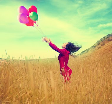 Girl walking in a field clipart